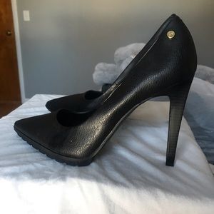 Calvin Klein black heels .